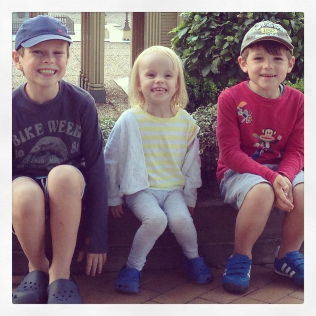 All three children in one picture, looking at the camera and smiling. Hardly EVER happens!