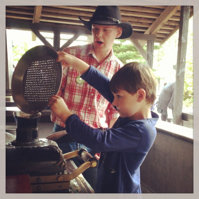 Casper took a break from the white knuckle rides to sift dor gold in the 'Western' area of the park 