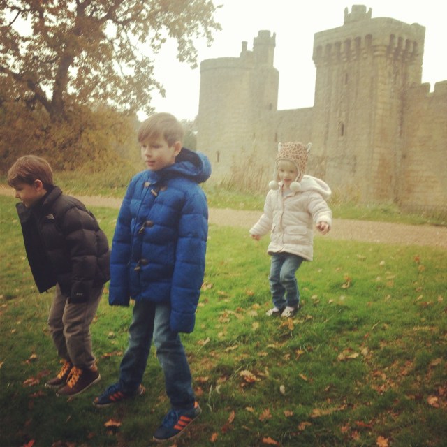 The children contemplating whether or not to roll down the muddy hill outside the castle. Luckily they decided not to! 