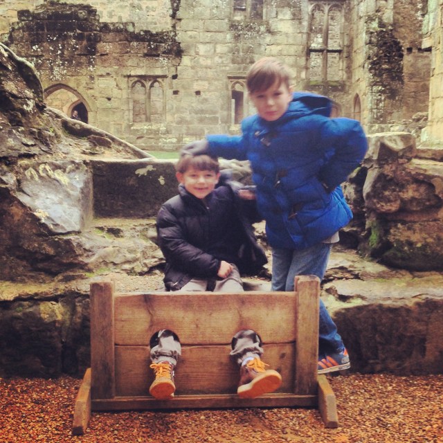 Cameron looks rather pleased to see his brother in the stocks!